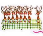 Ομάδα των Χριστουγέννων reindeers αναμονής για τα τρόφι&amp;#956